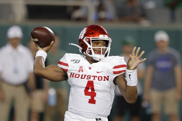 Houston quarterback D'Eriq King throws a pass during the first half of the team's NCAA college football game against Tulane in New Orleans, Thursday, Sept. 19, 2019. (AP Photo/Gerald Herbert)