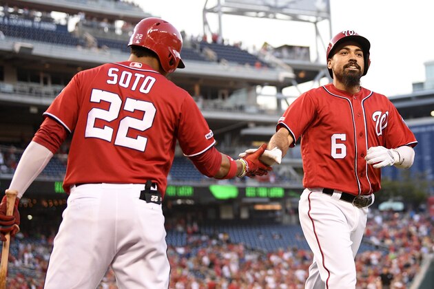 Washington Nationals' Anthony Rendon (6) celebrates his home run with Juan Soto during the first inning of a baseball game against the Miami Marlins, Saturday, Aug. 31, 2019, in Washington. (AP Photo/Nick Wass)
