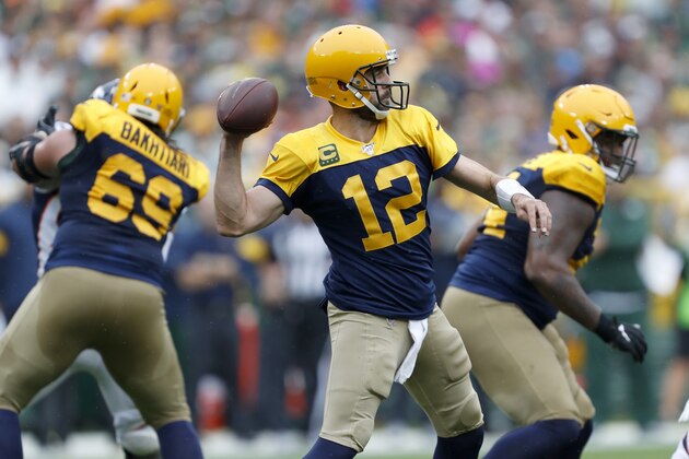 Green Bay Packers quarterback Aaron Rodgers throws during the first half of an NFL football game against the Denver Broncos Sunday, Sept. 22, 2019, in Green Bay, Wis. (AP Photo/Matt Ludtke)