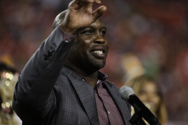 Former Washington Redskins linebacker London Fletcher is honored and places in the Ring of Honor, at halftime during an NFL football game between the Washington Redskins and the Chicago Bears, Monday, Sept. 23, 2019, in Landover, Md. (AP Photo/Julio Cortez)