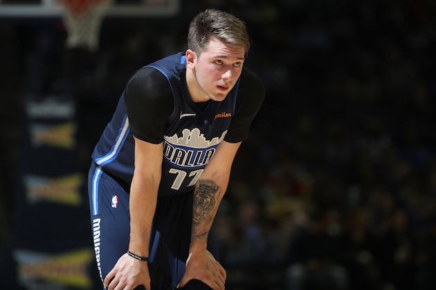 MEMPHIS, TN - NOVEMBER 19: Luka Doncic #77 of the Dallas Mavericks looks on during the game against the Memphis Grizzlies on November 19, 2018 at FedExForum in Memphis, Tennessee. NOTE TO USER: User expressly acknowledges and agrees that, by downloading and/or using this photograph, user is consenting to the terms and conditions of the Getty Images License Agreement. Mandatory Copyright Notice: Copyright 2018 NBAE (Photo by Joe Murphy/NBAE via Getty Images)