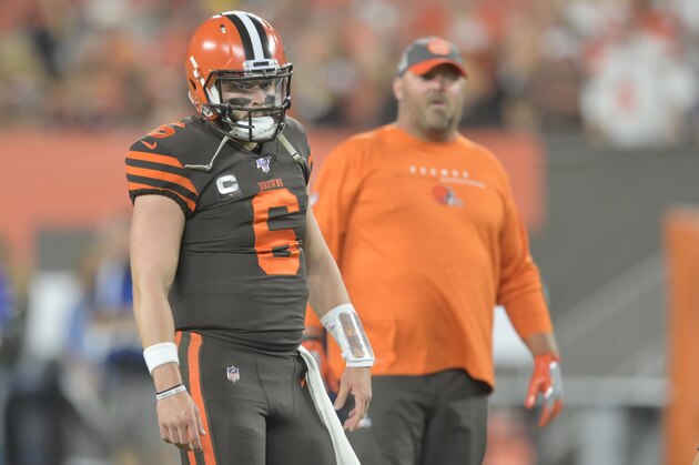 Cleveland Browns quarterback Baker Mayfield (6) stands near head coach Freddie Kitchens before an NFL football game against the Los Angeles Rams, Sunday, Sept. 22, 2019, in Cleveland. The Rams won 20-13. (AP Photo/David Richard)