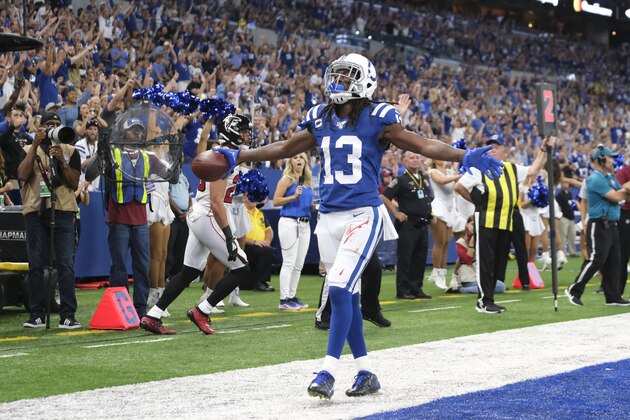 Indianapolis Colts wide receiver T.Y. Hilton (13) reacts after making a touchdown reception during the first half of an NFL football game against the Atlanta Falcons, Sunday, Sept. 22, 2019, in Indianapolis. (AP Photo/AJ Mast)