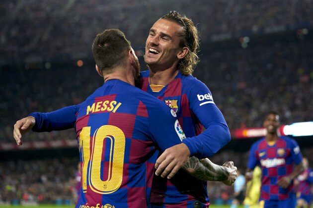 BARCELONA, SPAIN - SEPTEMBER 24: Antoine Griezmann and Lionel Messi of FC Barcelona celebrating their team's first goal during the Liga match between FC Barcelona and Villarreal CF at Camp Nou on September 24, 2019 in Barcelona, Spain. (Photo by Quality Sport Images/Getty Images)