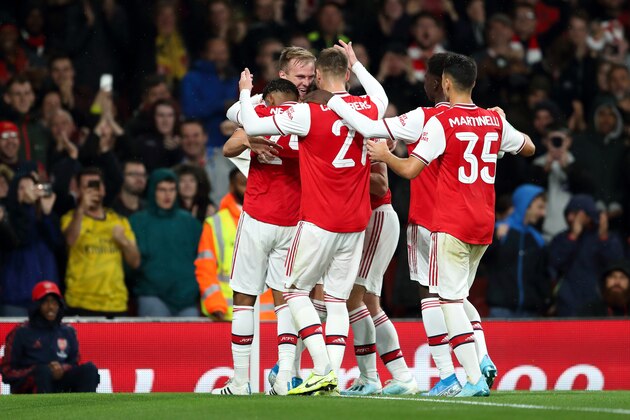 LONDON, ENGLAND - SEPTEMBER 24: Rob Holding of Arsenal celebrates after scoring a goal to make it 2-0 during the Carabao Cup Third Round match between Arsenal and Nottingham Forest at Emirates Stadium on September 24, 2019 in London, England. (Photo by James Williamson - AMA/Getty Images)