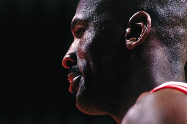 CHICAGO, IL - MAY 6:  Michael Jordan #23 of the Chicago Bulls looks on against the Charlotte Hornets on May 6, 1998 at the United Center in Chicago, Illinois. NOTE TO USER: User expressly acknowledges and agrees that, by downloading and or using this photograph, user is consenting to the terms and conditions of the Getty Images License Agreement.  Mandatory Copyright Notice: Copyright 1998 NBAE (Photo by Scott Cunningham/NBAE via Getty Images)