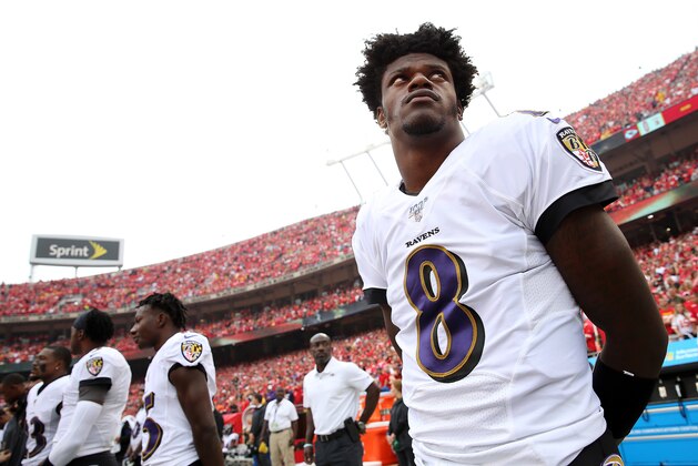 KANSAS CITY, MISSOURI - SEPTEMBER 22:  Quarterback Lamar Jackson #8 of the Baltimore Ravens stands during the national anthem before their game against the Kansas City Chiefs at Arrowhead Stadium on September 22, 2019 in Kansas City, Missouri. (Photo by Jamie Squire/Getty Images)