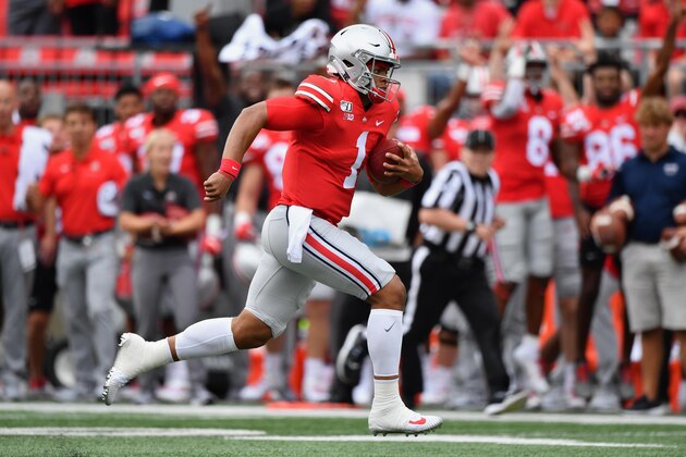 COLUMBUS, OH - AUGUST 31:  Quarterback Justin Fields #1 of the Ohio State Buckeyes runs with the ball against the Florida Atlantic Owls at Ohio Stadium on August 31, 2019 in Columbus, Ohio.  (Photo by Jamie Sabau/Getty Images)
