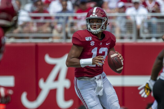 Alabama quarterback Tua Tagovailoa (13) rolls out to throw against Southern Miss during the second half of an NCAA college football game, Saturday, Sept. 21, 2019, in Tuscaloosa, Ala. (AP Photo/Vasha Hunt)