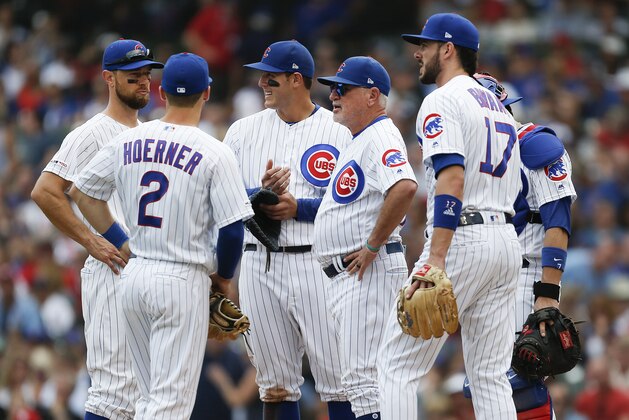 CHICAGO, ILLINOIS - SEPTEMBER 21: Manager Joe Maddon #70 of the Chicago Cubs visits the mound for a pitching change during the fourth inning of a game against the St. Louis Cardinals at Wrigley Field on September 21, 2019 in Chicago, Illinois. (Photo by Nuccio DiNuzzo/Getty Images)