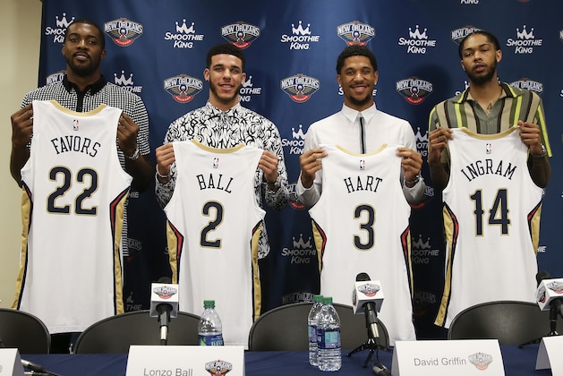 METAIRIE, LA - JULY 16: Derrick Favors #22, Lonzo Ball #2, Josh Hart #3, and Brandon Ingram #14 of the New Orleans Pelicans pose for a photo at the introductory press conference on July 16, 2019 at Ochsner Sports Performance Center in Metairie, Louisiana. NOTE TO USER: User expressly acknowledges and agrees that, by downloading and or using this Photograph, user is consenting to the terms and conditions of the Getty Images License Agreement. Mandatory Copyright Notice: Copyright 2019 NBAE (Photo by Layne Murdoch Jr./NBAE via Getty Images