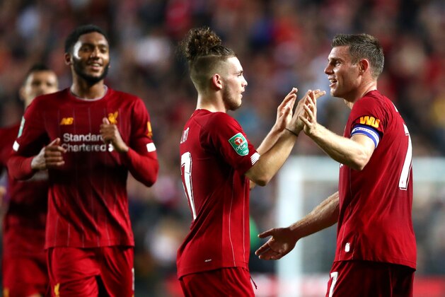 MILTON KEYNES, ENGLAND - SEPTEMBER 25: James Milner of Liverpool celebrates scoring his teams first goal during the Carabao Cup Third Round match between Mk Dons and Liverpool FC at Stadium MK on September 25, 2019 in Milton Keynes, England. (Photo by Chloe Knott - Danehouse/Getty Images)