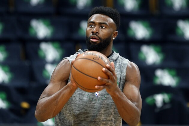 Boston Celtics' Jaylen Brown warms up before Game 3 of a second round NBA basketball playoff series against the Milwaukee Bucks in Boston, Friday, May 3, 2019. (AP Photo/Michael Dwyer)