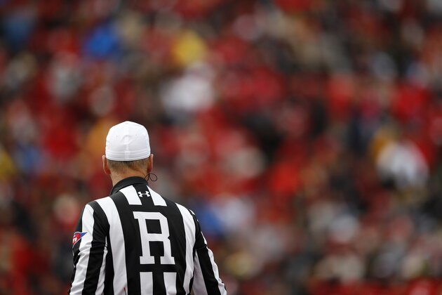 A referee watches the second half of an NCAA college football game between Maryland and Rutgers, Saturday, Oct. 13, 2018, in College Park, Md. (AP Photo/Patrick Semansky)