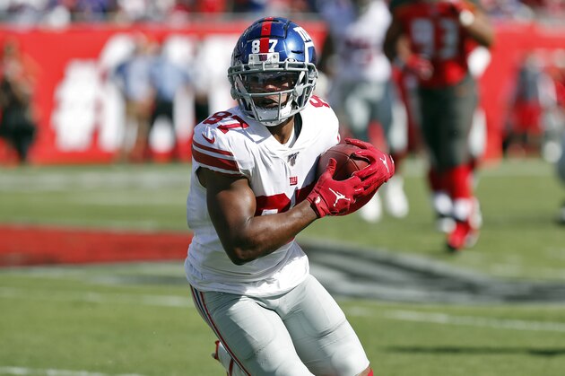 New York Giants wide receiver Sterling Shepard (87) runs with the ball against the Tampa Bay Buccaneers during the first half of an NFL football game Sunday, Sept. 22, 2019, in Tampa, Fla. (AP Photo/Mark LoMoglio)