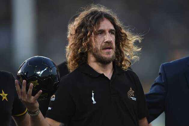 Spanish former football player Carles Puyol holds a football during the final Twenty20 Pakistan Super League (PSL) at the National Cricket Stadium in Karachi on March 17, 2019. - Barcelona legend Carles Puyol arrived Karachi to promote football and kick off ticket sales for World Soccer Stars 2019. (Photo by ASIF HASSAN / AFP)        (Photo credit should read ASIF HASSAN/AFP/Getty Images)