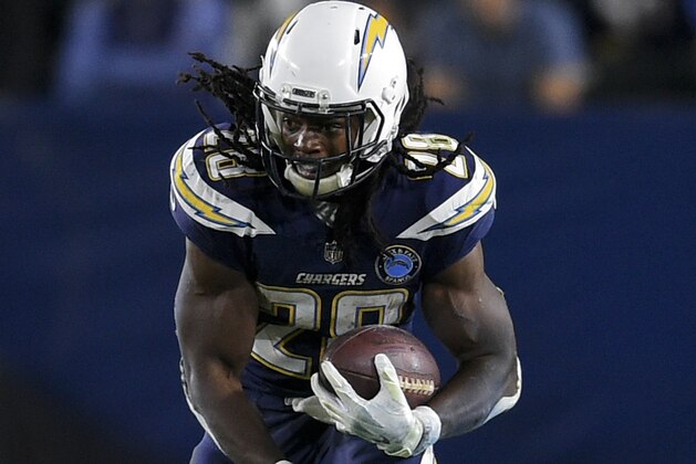 Los Angeles Chargers running back Melvin Gordon runs the ball during the second half of an NFL football game against the Baltimore Ravens in Carson, Calif., Sunday, Dec. 23, 2018. (AP Photo/Kelvin Kuo)