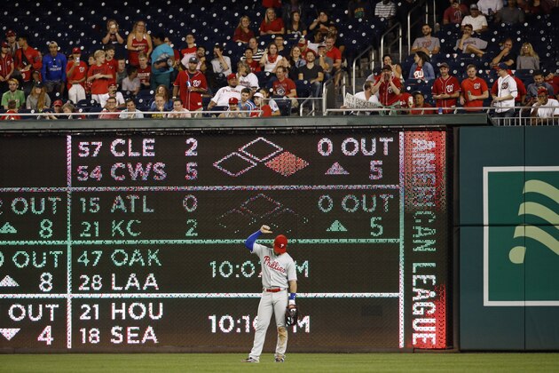 Philadelphia Phillies right fielder Bryce Harper gestures to spectators in the stands during the eighth inning of the team's baseball game against the Washington Nationals, Wednesday, Sept. 25, 2019, in Washington. (AP Photo/Patrick Semansky) Philadelphia Phillies right fielder Bryce Harper gestures to spectators in the stands during the eighth inning of the team's baseball game against the Washington Nationals, Wednesday, Sept. 25, 2019, in Washington. (AP Photo/Patrick Semansky)