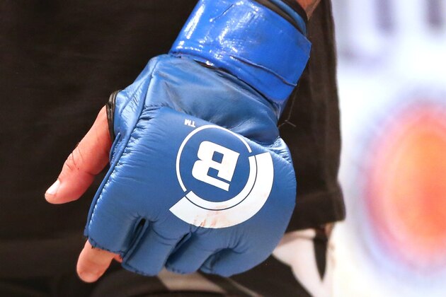 A closeup of the Bellator logo on a glow at Bellator 134 on Friday, Feb. 27, 2015, in Uncasville, CT.  (AP Photo/Gregory Payan)