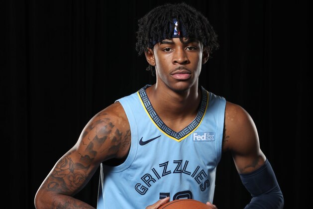 MEMPHIS, TN - AUGUST 1: Ja Morant #12 of the Memphis Grizzlies poses for a portrait on August 1, 2019 at FedExForum in Memphis, Tennessee. NOTE TO USER: User expressly acknowledges and agrees that, by downloading and or using this photograph, User is consenting to the terms and conditions of the Getty Images License Agreement. Mandatory Copyright Notice: Copyright 2019 NBAE (Photo by Joe Murphy/NBAE via Getty Images)