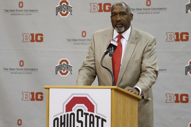 Ohio State athletic director Gene Smith introduces Chris Holtmann as the new men's head basketball coach at Ohio State during a news conference Monday, June 12, 2017, in Columbus, Ohio. (AP Photo/Jay LaPrete)