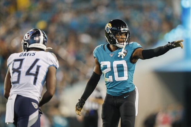 JACKSONVILLE, FLORIDA - SEPTEMBER 19: Jalen Ramsey #20 of the Jacksonville Jaguars defends against Corey Davis #84 of the Tennessee Titans during the third quarter of a game at TIAA Bank Field on September 19, 2019 in Jacksonville, Florida. (Photo by James Gilbert/Getty Images)