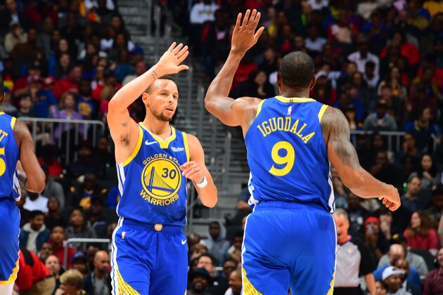 ATLANTA, GA - DECEMBER 3: Stephen Curry #30 and Andre Iguodala #9 of the Golden State Warriors celebrates during the game against the Atlanta Hawks on December 3, 2018 at State Farm Arena in Atlanta, Georgia.  NOTE TO USER: User expressly acknowledges and agrees that, by downloading and/or using this Photograph, user is consenting to the terms and conditions of the Getty Images License Agreement. Mandatory Copyright Notice: Copyright 2018 NBAE (Photo by Scott Cunningham/NBAE via Getty Images)