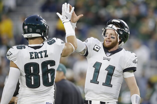 Philadelphia Eagles quarterback Carson Wentz (11) and tight end Zach Ertz warm up before the start of an NFL football game between the Green Bay Packers and Philadelphia Eagles Thursday, Sept. 26, 2019, in Green Bay, Wis. (AP Photo/Jeffrey Phelps) Philadelphia Eagles quarterback Carson Wentz (11) and tight end Zach Ertz warm up before the start of an NFL football game between the Green Bay Packers and Philadelphia Eagles Thursday, Sept. 26, 2019, in Green Bay, Wis. (AP Photo/Jeffrey Phelps)