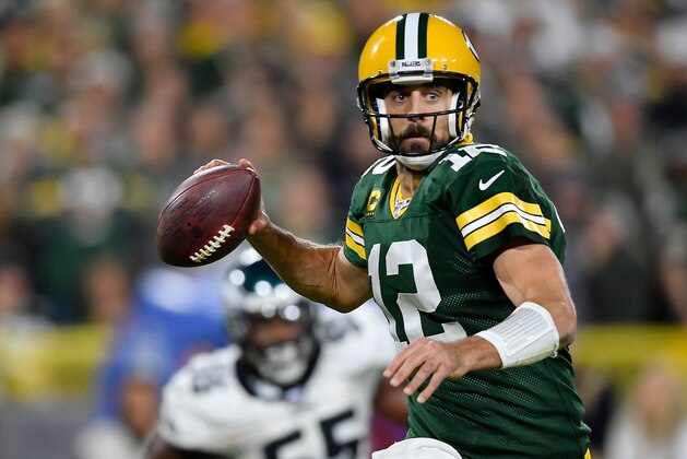 GREEN BAY, WISCONSIN - SEPTEMBER 26: Aaron Rodgers #12 of the Green Bay Packers looks to pass the football in the fourth quarter against the Philadelphia Eagles at Lambeau Field on September 26, 2019 in Green Bay, Wisconsin. (Photo by Quinn Harris/Getty Images)