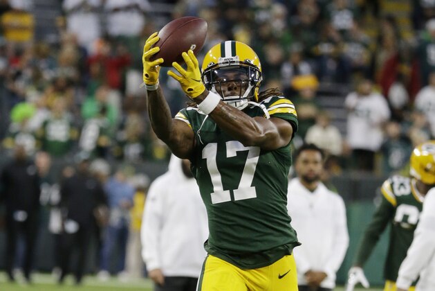 Green Bay Packers wide receiver Davante Adams warms up before the start of an NFL football game between the Green Bay Packers and Philadelphia Eagles Thursday, Sept. 26, 2019, in Green Bay, Wis. (AP Photo/Mike Roemer)