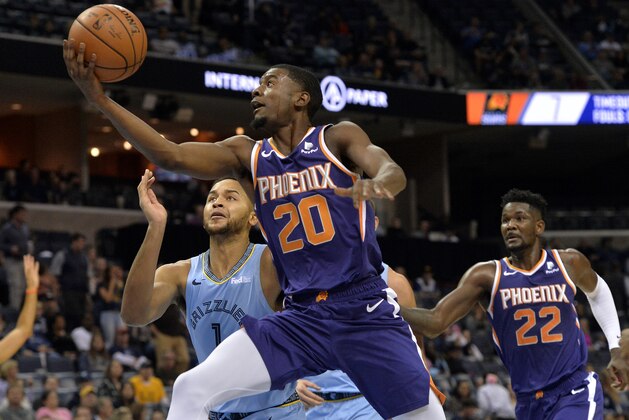Phoenix Suns forward Josh Jackson (20) shoots against Memphis Grizzlies forward Kyle Anderson (1) in the first half of an NBA basketball game Saturday, Oct. 27, 2018, in Memphis, Tenn. (AP Photo/Brandon Dill)