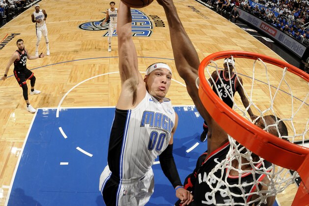 ORLANDO, FL - APRIL 21:  Aaron Gordon #00 of the Orlando Magic dunks the ball against the Toronto Raptors during Game Four of Round One of the 2019 NBA Playoffs on April 21, 2019 at Amway Center in Orlando, Florida. NOTE TO USER: User expressly acknowledges and agrees that, by downloading and or using this photograph, User is consenting to the terms and conditions of the Getty Images License Agreement. Mandatory Copyright Notice: Copyright 2019 NBAE (Photo by Fernando Medina/NBAE via Getty Images)