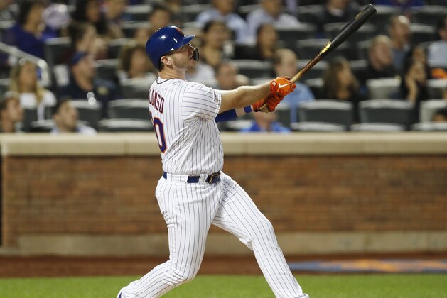 New York Mets' Pete Alonso (20) watches his three-run home run in the second inning of the team's baseball game against the Miami Marlins, Wednesday, Sept. 25, 2019, in New York. (AP Photo/Kathy Willens)