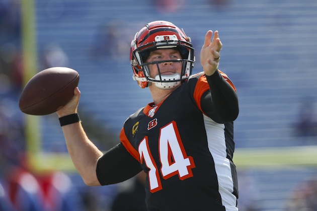 Cincinnati Bengals quarterback Andy Dalton (14) triple playas he warms up before a NFL football game against the Buffalo Bills Sunday, Sept. 22, 2019., in Orchard Park, N.Y. (AP Photo/John Munson)