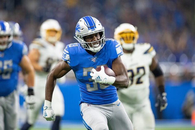 DETROIT, MI - SEPTEMBER 15: Kerryon Johnson #33 of the Detroit Lions scores on a 36 heard pass from quarterback Matthew Stafford #9 (not in photo) during the first quarter of the game against the Los Angeles Chargers at Ford Field on September 15, 2019 in Detroit, Michigan. (Photo by Leon Halip/Getty Images)