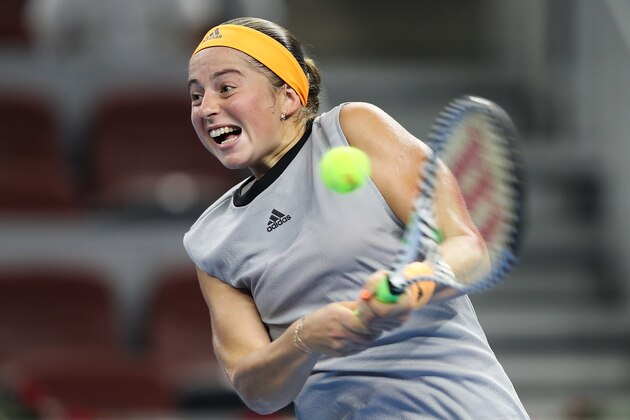 BEIJING, CHINA - SEPTEMBER 28: Jelena Ostapenko of Latvia returns a shot against Karolina Pliskova of the Czech Republic during women's singles first round match of 2019 China Open at the China National Tennis Center on September 28, 2019 in Beijing, China. (Photo by Lintao Zhang/Getty Images)