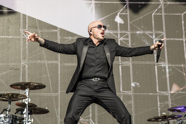 Pitbull performs at the New Orleans Jazz and Heritage Festival on Saturday, May 4, 2019, in New Orleans. (Photo by Amy Harris/Invision/AP)