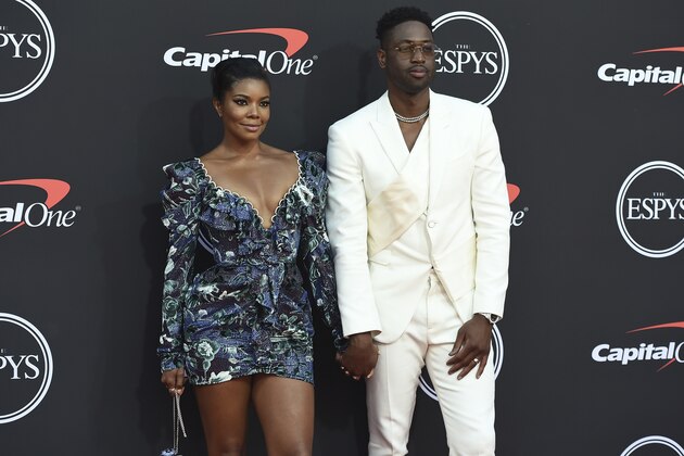 Gabrielle Union, left, and Dwyane Wade arrive at the ESPY Awards on Wednesday, July 10, 2019, at the Microsoft Theater in Los Angeles. (Photo by Jordan Strauss/Invision/AP)