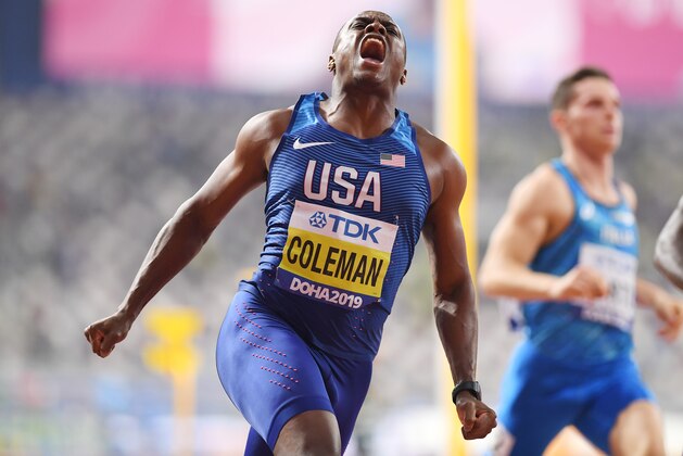 DOHA, QATAR - SEPTEMBER 28: Christian Coleman of the United States celebrates winning gold in the Men's 100 Metres final during day two of 17th IAAF World Athletics Championships Doha 2019 at Khalifa International Stadium on September 28, 2019 in Doha, Qatar. (Photo by Matthias Hangst/Getty Images)