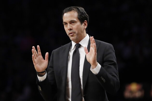 Miami Heat head coach Erik Spoelstra gestures toward his players during the first half of an NBA basketball game against the Brooklyn Nets, Wednesday, April 10, 2019, in New York. (AP Photo/Kathy Willens)