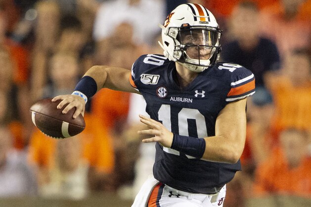 AUBURN, AL - SEPTEMBER 28: Quarterback Bo Nix #10 of the Auburn Tigers looks to throw a pass during the second quarter of their game against the Mississippi State Bulldogs at Jordan-Hare Stadium on September 28, 2019 in Auburn, AL. (Photo by Michael Chang/Getty Images)