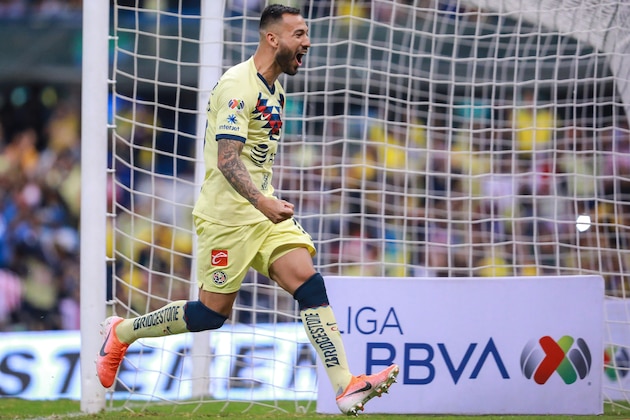 MEXICO CITY, MEXICO - SEPTEMBER 28: Emanuel Aguilera #19 of America celebrates the third scored goal of America during the 12th round match between America and Chivas as part of the Torneo Apertura 2019 Liga MX at Azteca Stadium on September 28, 2019 in Mexico City, Mexico. (Photo by Manuel Velasquez/Getty Images)
