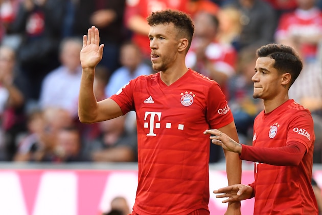 Bayern Munich's Croatian midfielder Ivan Perisic (L) and Bayern Munich's Brazilian midfielder Philippe Coutinho react after their club's fourth goal during the German first division Bundesliga football match between FC Bayern Munich and 1 FC Cologne in Munich, southhern Germany on September 21, 2019. (Photo by Christof STACHE / AFP) / DFL REGULATIONS PROHIBIT ANY USE OF PHOTOGRAPHS AS IMAGE SEQUENCES AND/OR QUASI-VIDEO (Photo credit should read CHRISTOF STACHE/AFP/Getty Images) Bayern Munich's Croatian midfielder Ivan Perisic (L) and Bayern Munich's Brazilian midfielder Philippe Coutinho react after their club's fourth goal during the German first division Bundesliga football match between FC Bayern Munich and 1 FC Cologne in Munich, southhern Germany on September 21, 2019. (Photo by Christof STACHE / AFP) / DFL REGULATIONS PROHIBIT ANY USE OF PHOTOGRAPHS AS IMAGE SEQUENCES AND/OR QUASI-VIDEO (Photo credit should read CHRISTOF STACHE/AFP/Getty Images)