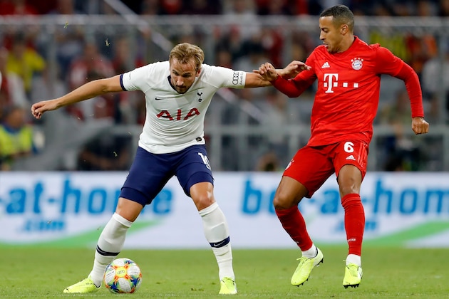 MUNICH, GERMANY - JULY 31: (L-R) Harry Kane of Tottenham Hotspur, Thiago of Bayern Munchen  during the Audi Cup  match between Tottenham Hotspur v Bayern Munchen at the Allianz Arena on July 31, 2019 in Munich Germany (Photo by Rico Brouwer/Soccrates/Getty Images)