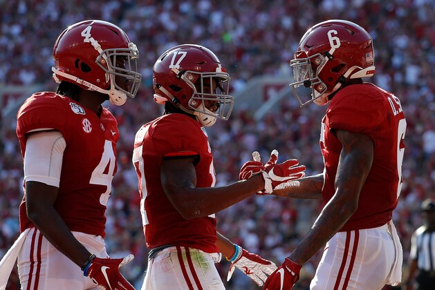 TUSCALOOSA, ALABAMA - SEPTEMBER 28:  DeVonta Smith #6 of the Alabama Crimson Tide reacts after scoring a touchdown against the Mississippi Rebels with Jerry Jeudy #4 and Jaylen Waddle #17 at Bryant-Denny Stadium on September 28, 2019 in Tuscaloosa, Alabama. (Photo by Kevin C. Cox/Getty Images)