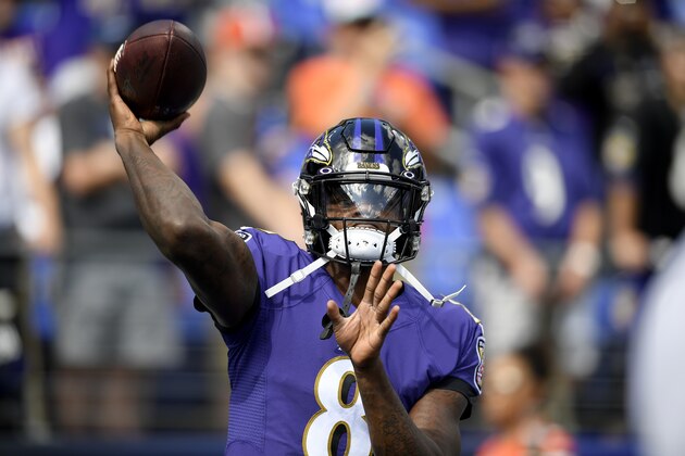 Baltimore Ravens quarterback Lamar Jackson works out prior to an NFL football game against the Cleveland Browns Sunday, Sept. 29, 2019, in Baltimore. (AP Photo/Nick Wass)