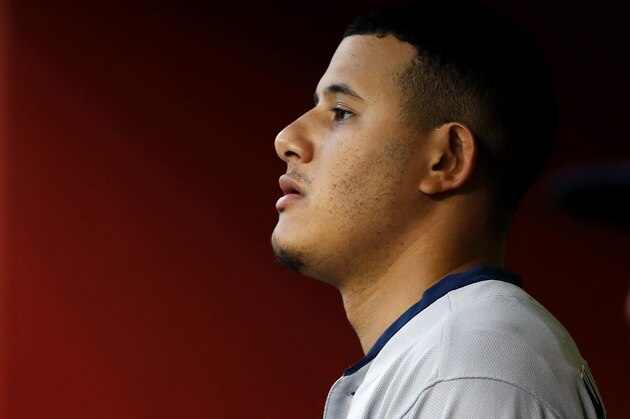 San Diego Padres' Manny Machado looks out from the dugout during a baseball game against the Arizona Diamondbacks, Saturday, Sept. 28, 2019, in Phoenix. (AP Photo/Ralph Freso)