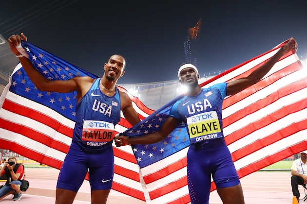 DOHA, QATAR - SEPTEMBER 29: Christian Taylor of the United States, gold, and Will Claye of the United States, silver, celebrate after the Men's Triple Jump final during day three of 17th IAAF World Athletics Championships Doha 2019 at Khalifa International Stadium on September 29, 2019 in Doha, Qatar. (Photo by Michael Steele/Getty Images)