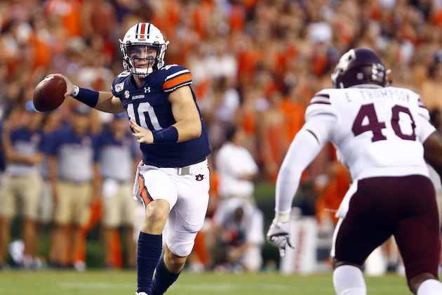 Auburn quarterback Bo Nix (10) rolls out to pass during the first half of an NCAA college football game against Mississippi State, Saturday, Sept. 28, 2019, in Auburn, Ala. (AP Photo/Butch Dill) Auburn quarterback Bo Nix (10) rolls out to pass during the first half of an NCAA college football game against Mississippi State, Saturday, Sept. 28, 2019, in Auburn, Ala. (AP Photo/Butch Dill)