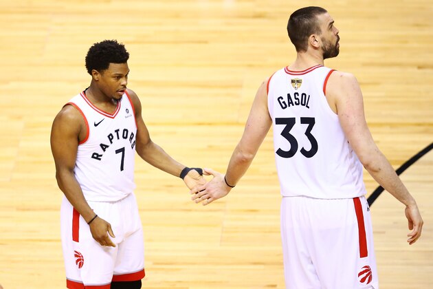 TORONTO, ONTARIO - JUNE 02:  Kyle Lowry #7 and Marc Gasol #33 of the Toronto Raptors react against the Golden State Warriors in the second half during Game Two of the 2019 NBA Finals at Scotiabank Arena on June 02, 2019 in Toronto, Canada.  NOTE TO USER: User expressly acknowledges and agrees that, by downloading and or using this photograph, User is consenting to the terms and conditions of the Getty Images License Agreement. (Photo by Vaughn Ridley/Getty Images)